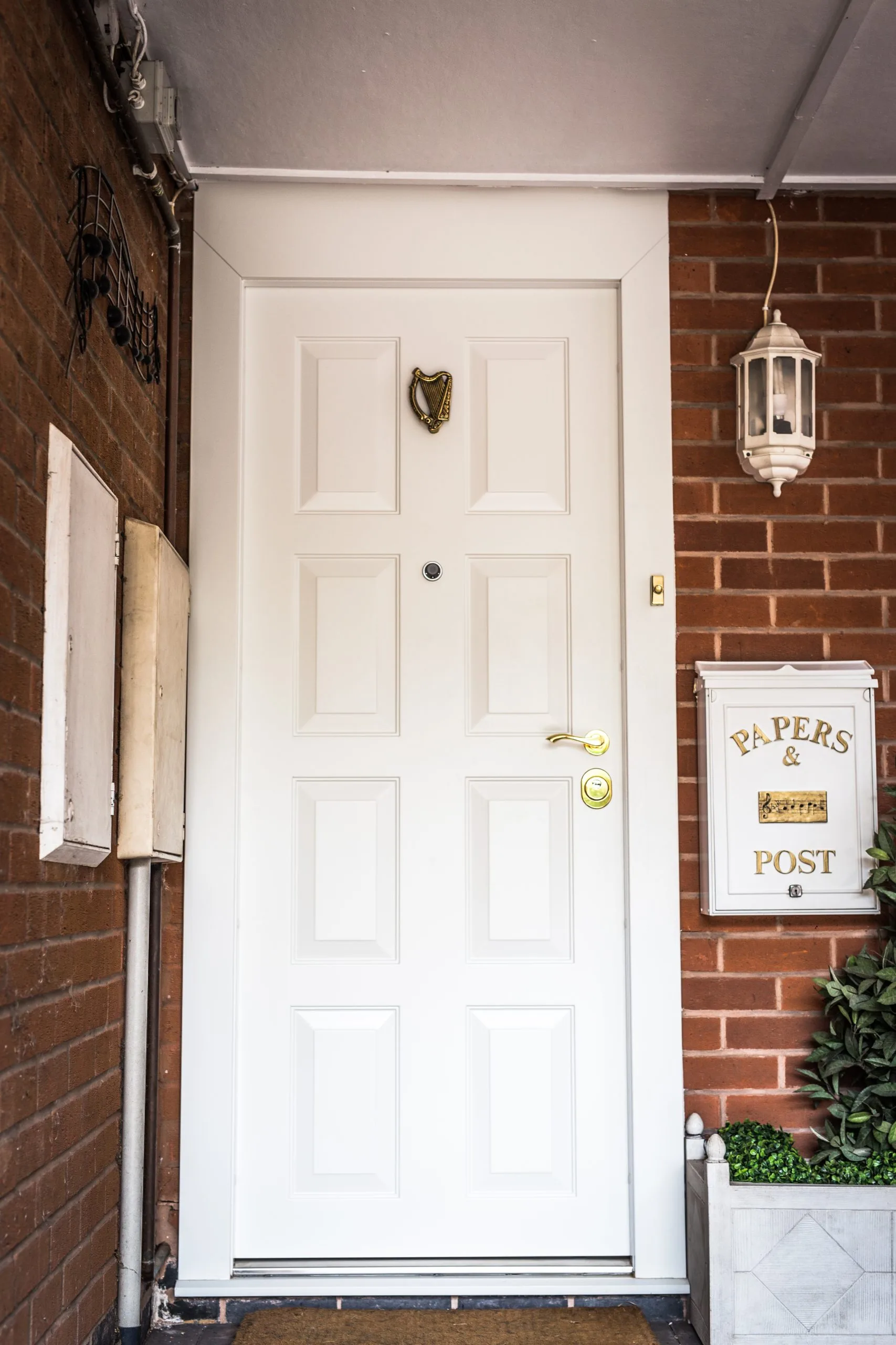 narrow-white-high-security-doors-wit-knocker