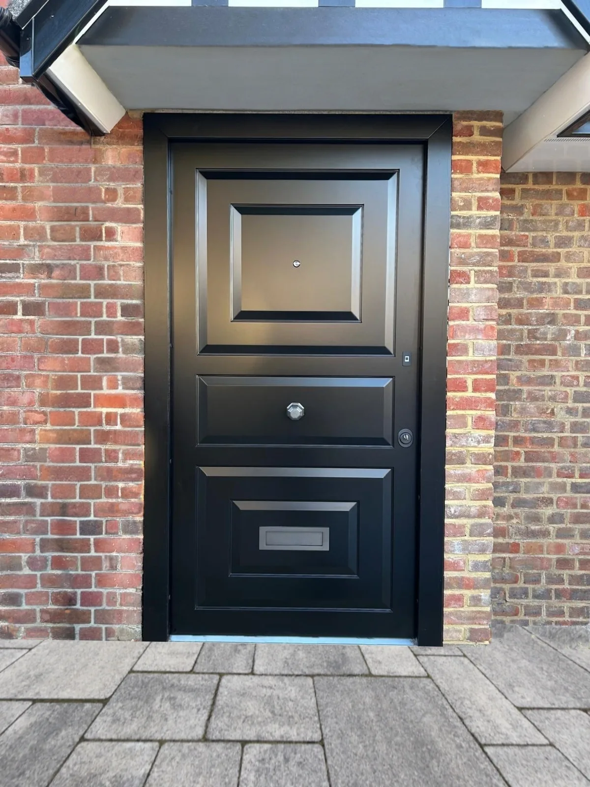 black_door_and_side_gate