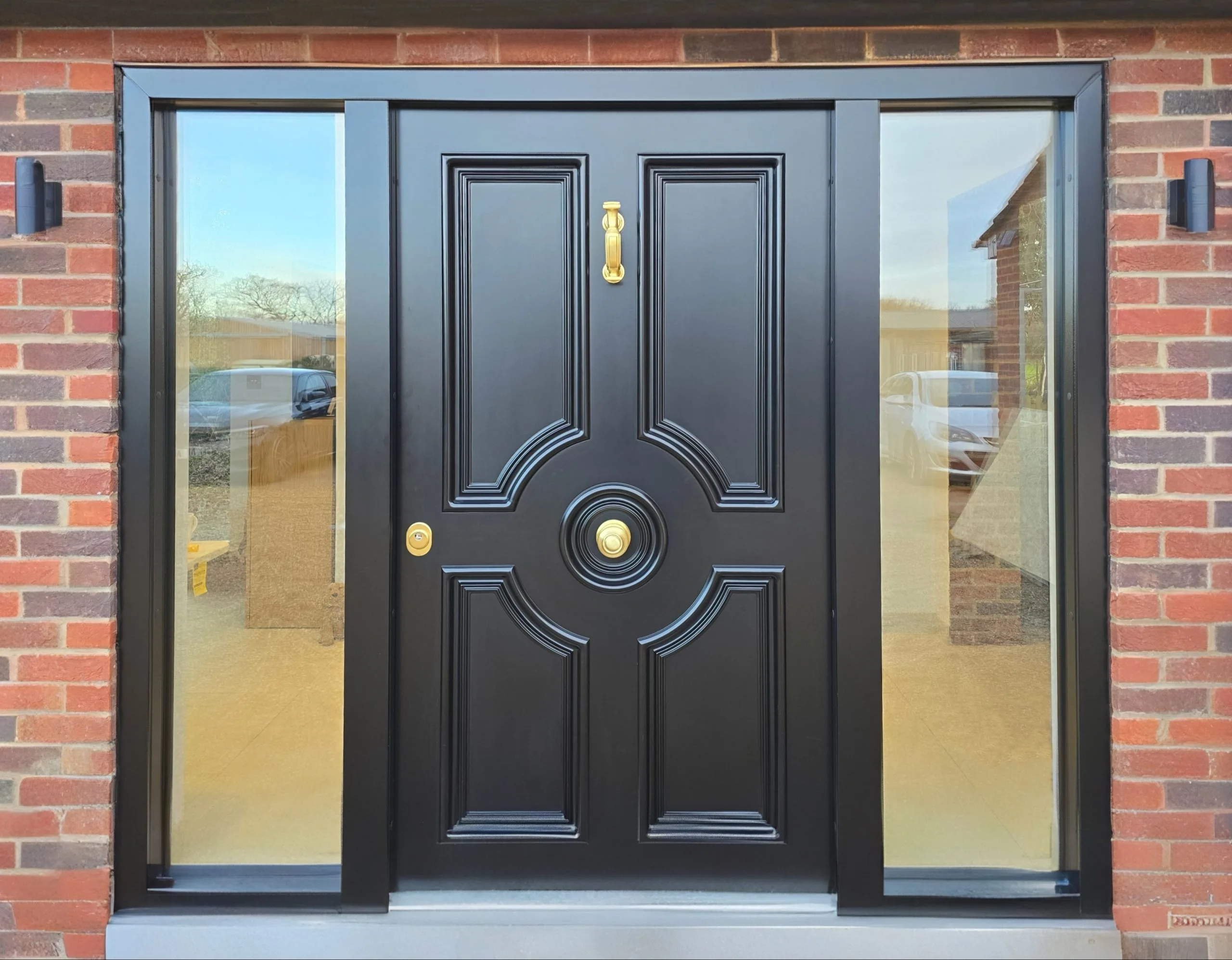 black_with_glazed_side_panels,_brass_furniture